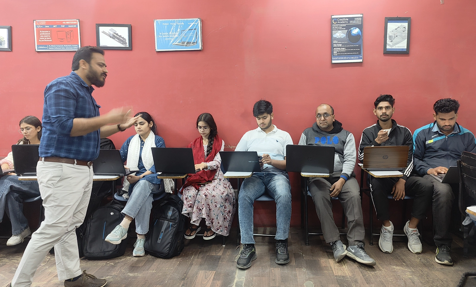 Mohsin Ahmad teaching a live coding session at Credible Academy